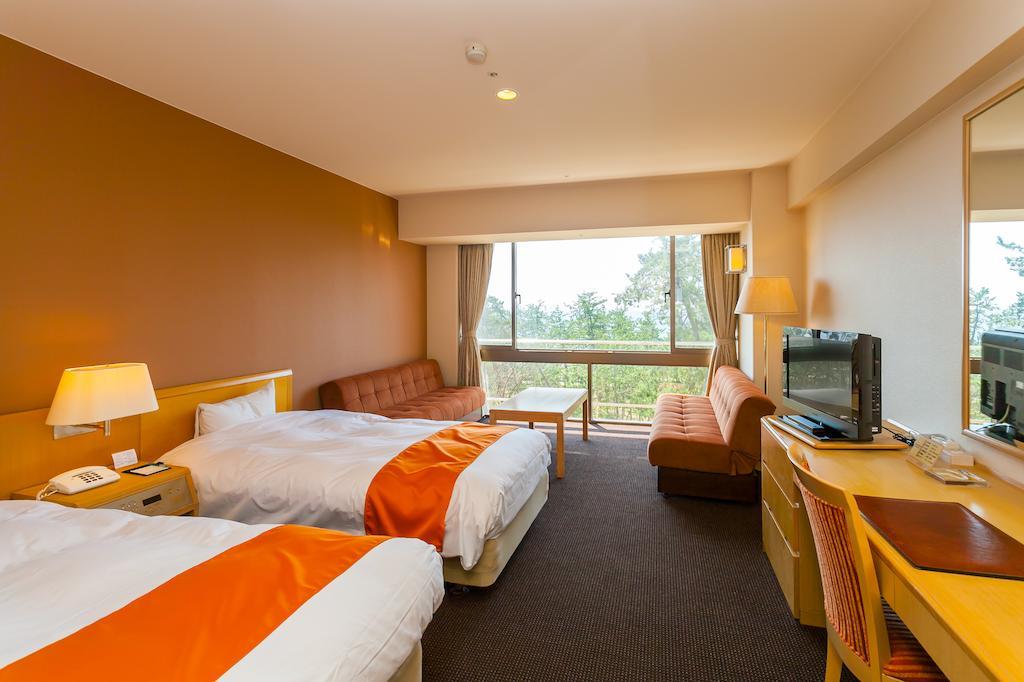 Suzu Beach Hotel Room photo
